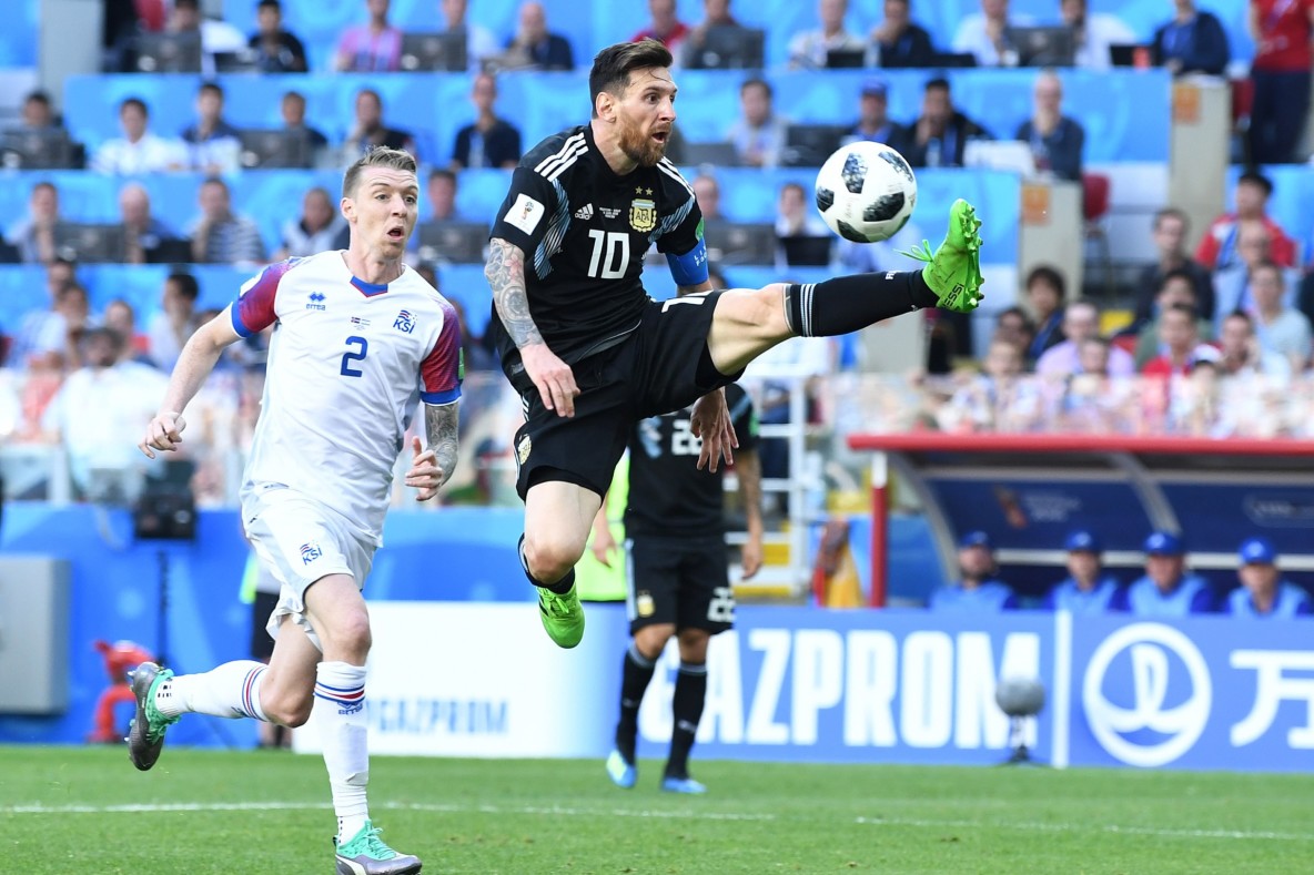 Soccer_World Cup_Argentina forward Lionel Messi and  Iceland defender Birkir Mar Svarsson