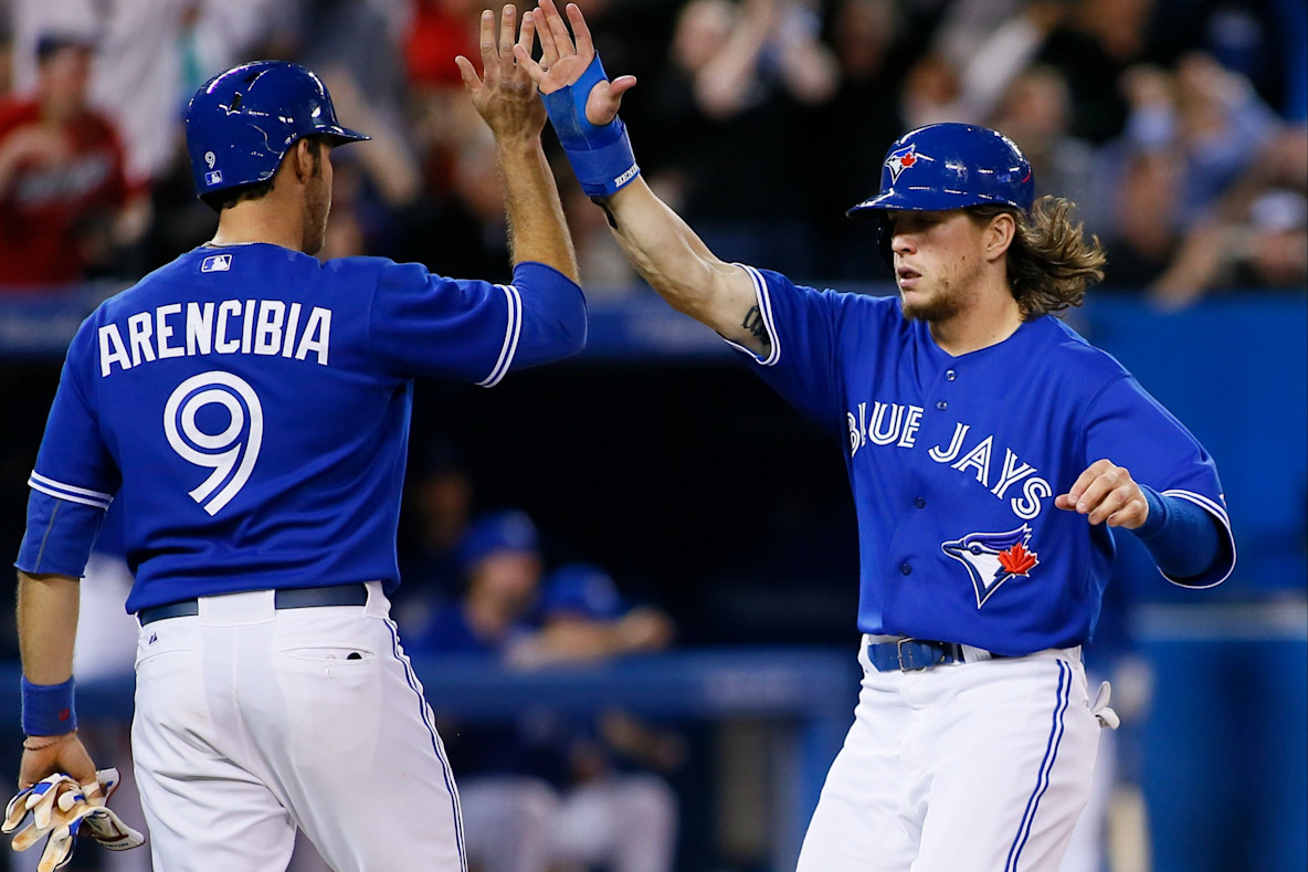 Baseball_MLB_Toronto Blue Jays' Toronto Blue Jays catcher J.P. Arencibia and center fielder Colby Rasmus